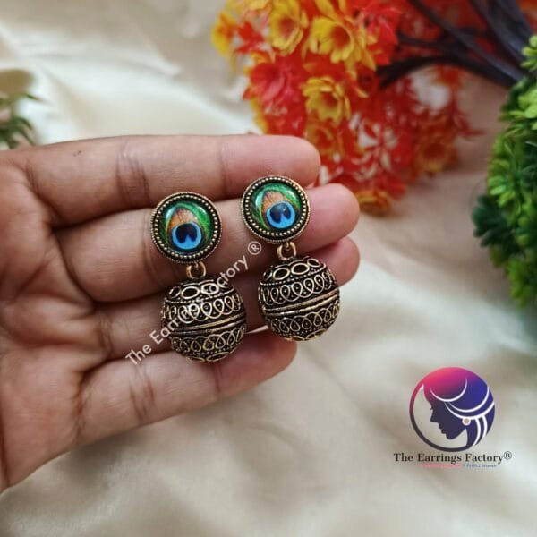 Trending Golden Ball Drop Peacock Earrings - Image 4
